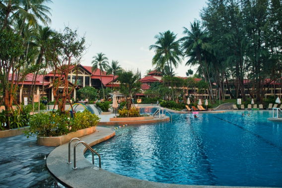 swimming-pool-near-green-trees-during-daytime.jpg swimming pool near green trees during daytime